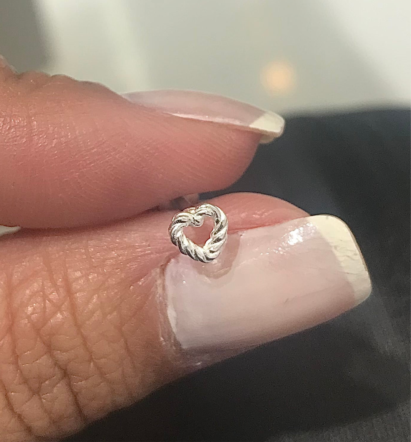 Piercing coração torcido